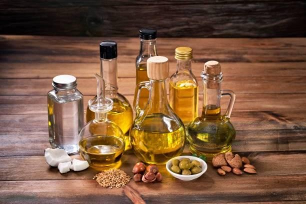 Natural hair oil export products from India in glass bottles prepared for international markets
