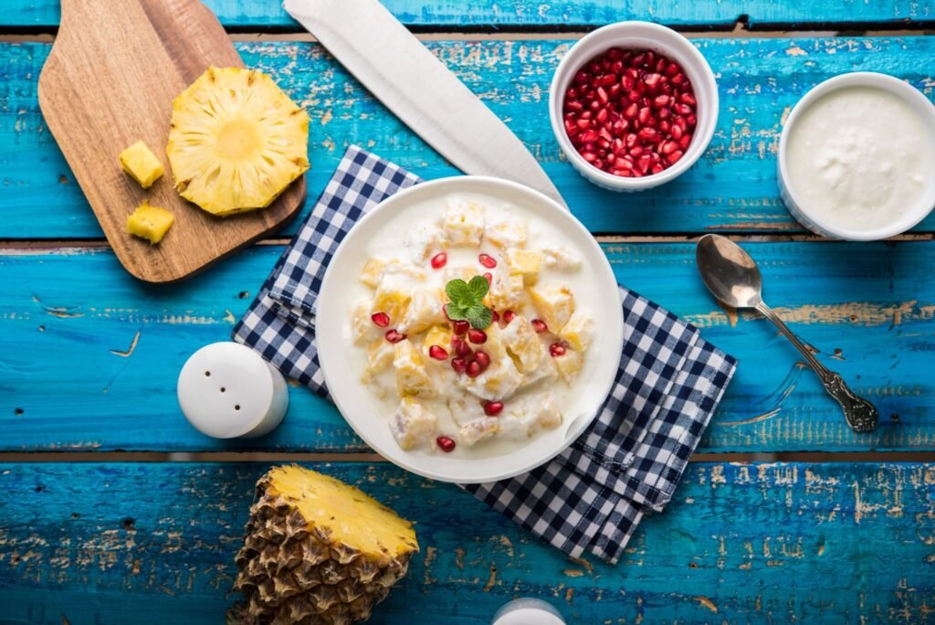 “Indian snacks growing worldwide shown through a flat lay of assorted Indian snacks.”